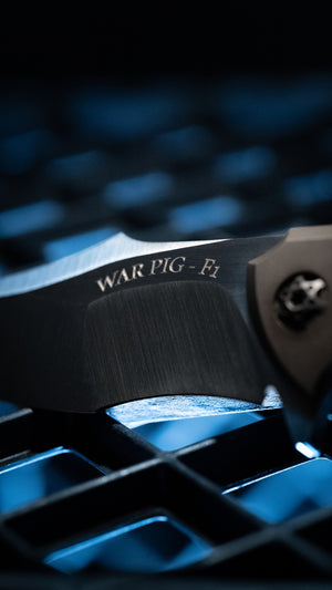War Pig-F1 | Aged Bronze Anodized Scales | Black Anodized Accents | Flame Treated Backspacer