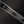 War Pig Custom | Silver Carbon Fiber | Serrations | Bronze Pins | Seafoam Spine
